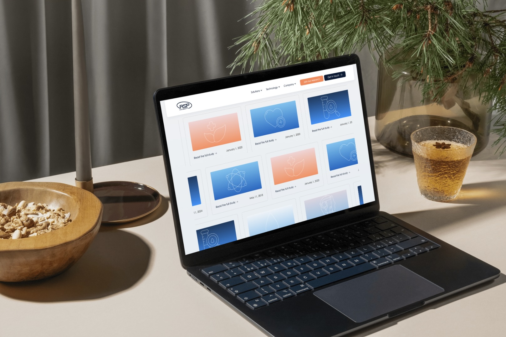 Publications grid editorial laptop shot